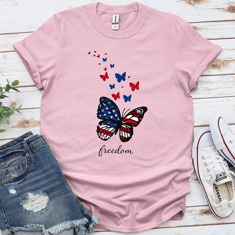 Light pink t-shirt with patriotic American flag butterfly and 'freedom' text design