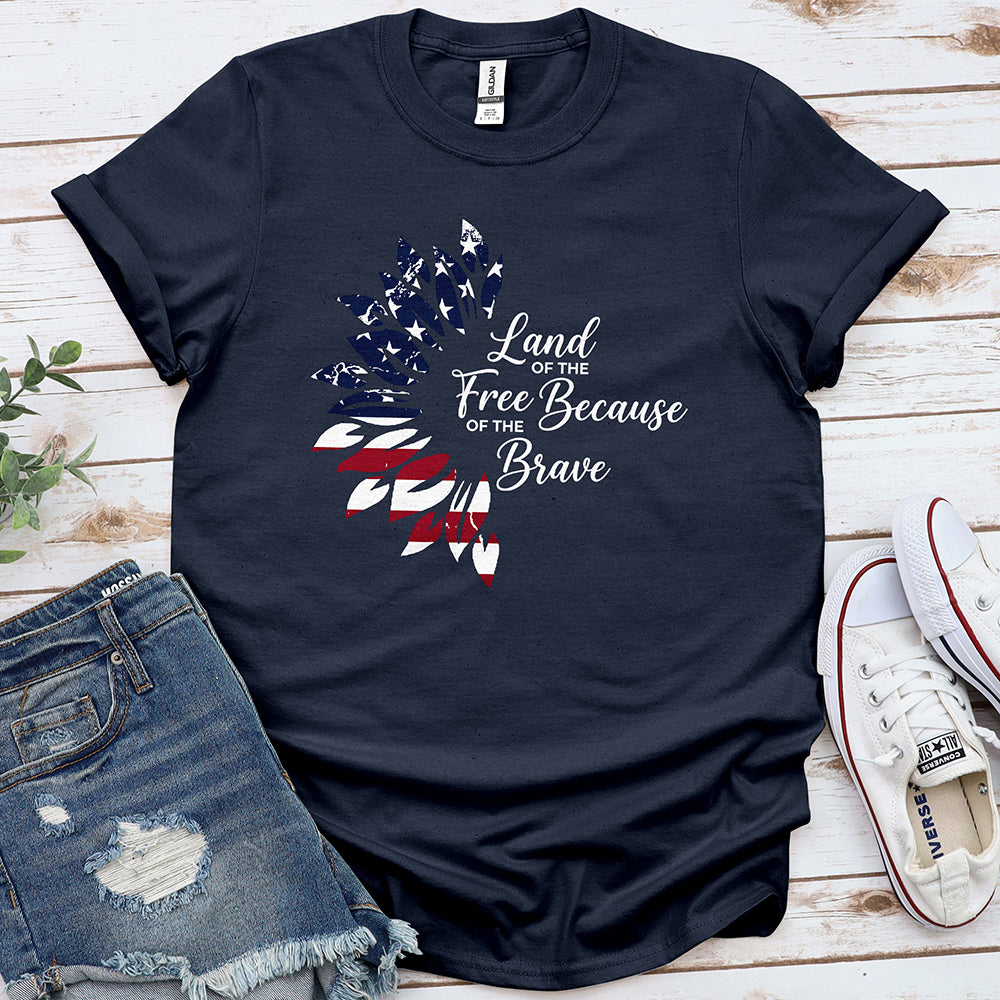 Navy patriotic t-shirt with feather American flag design and 'Land of the Free Because of the Brave' text