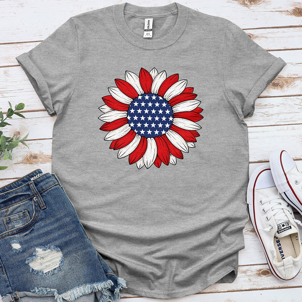 Grey t-shirt with patriotic sunflower graphic, red and white petals, blue star center