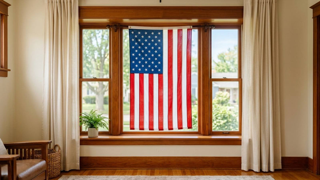 American flag displayed respectfully in a sunlit home window with the union at upper left