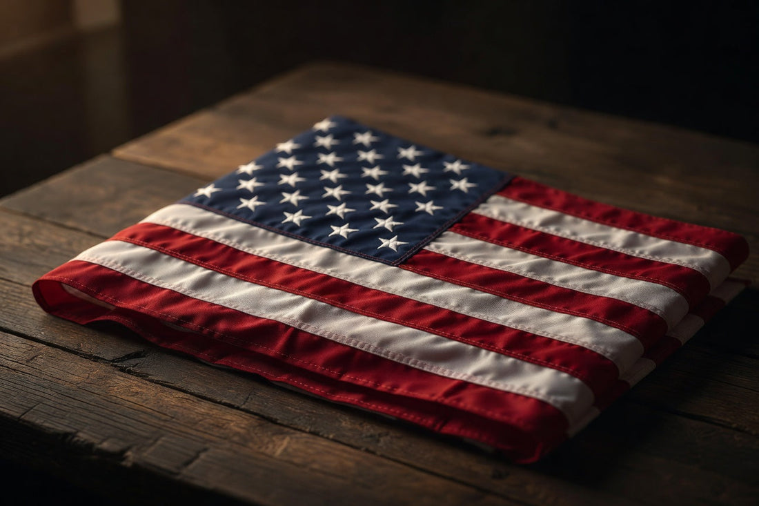 Folded American flag on rustic wooden table, patriotic decor, US flag display