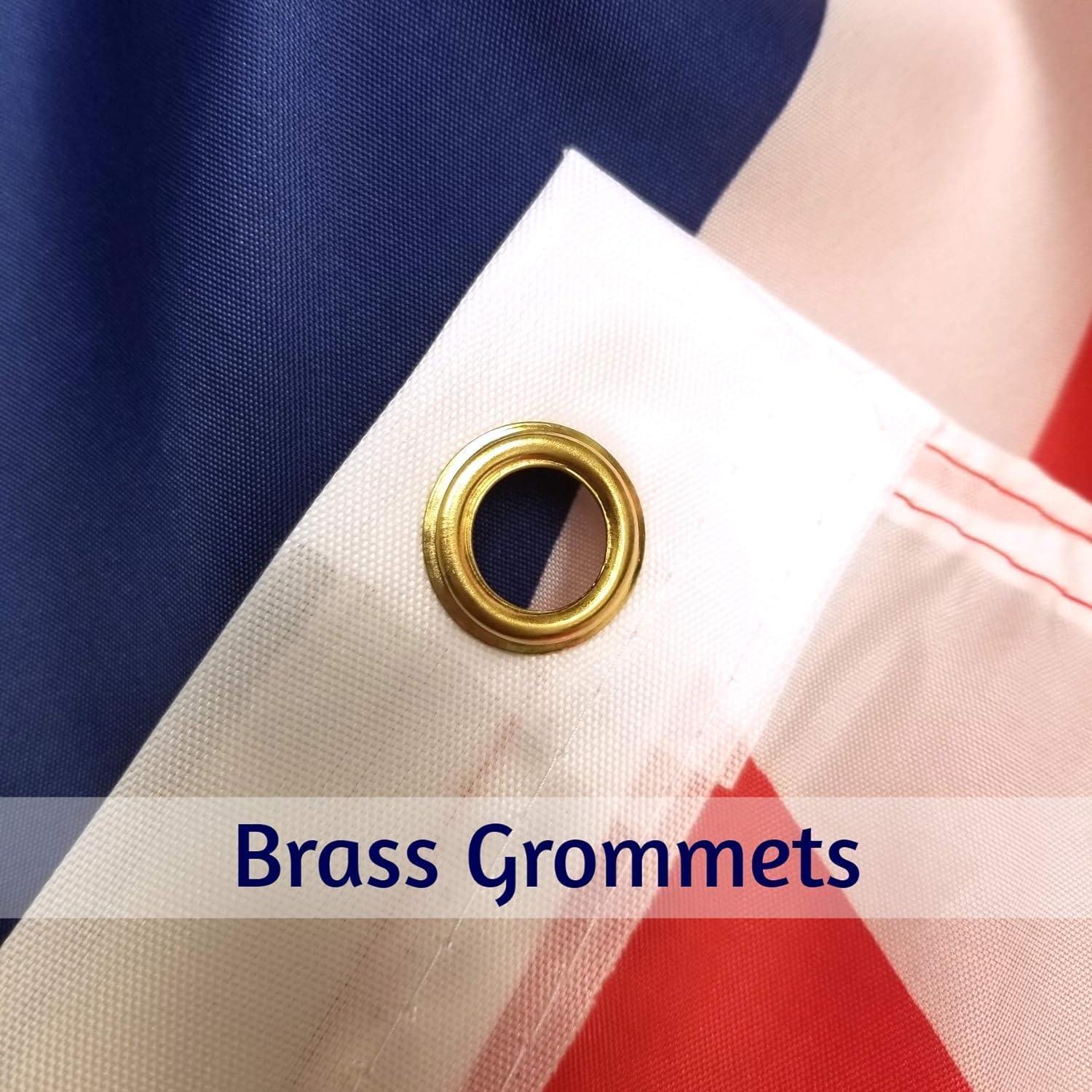 Close-up of brass grommet on durable American flag fabric, Proud & Free branding