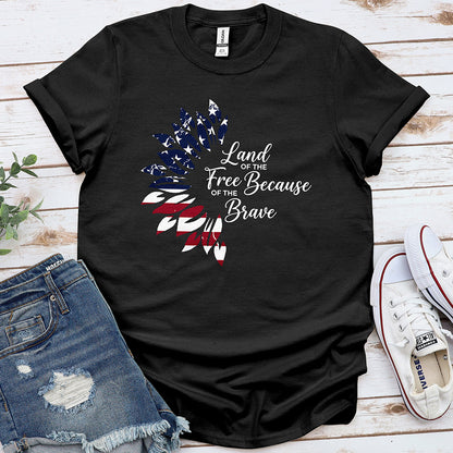 Black patriotic t-shirt with American flag feather design and 'Land of the Free Because of the Brave' text