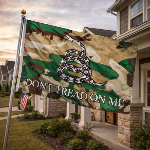Camo Gadsden flag with coiled rattlesnake and 'Don't Tread On Me' text on house porch