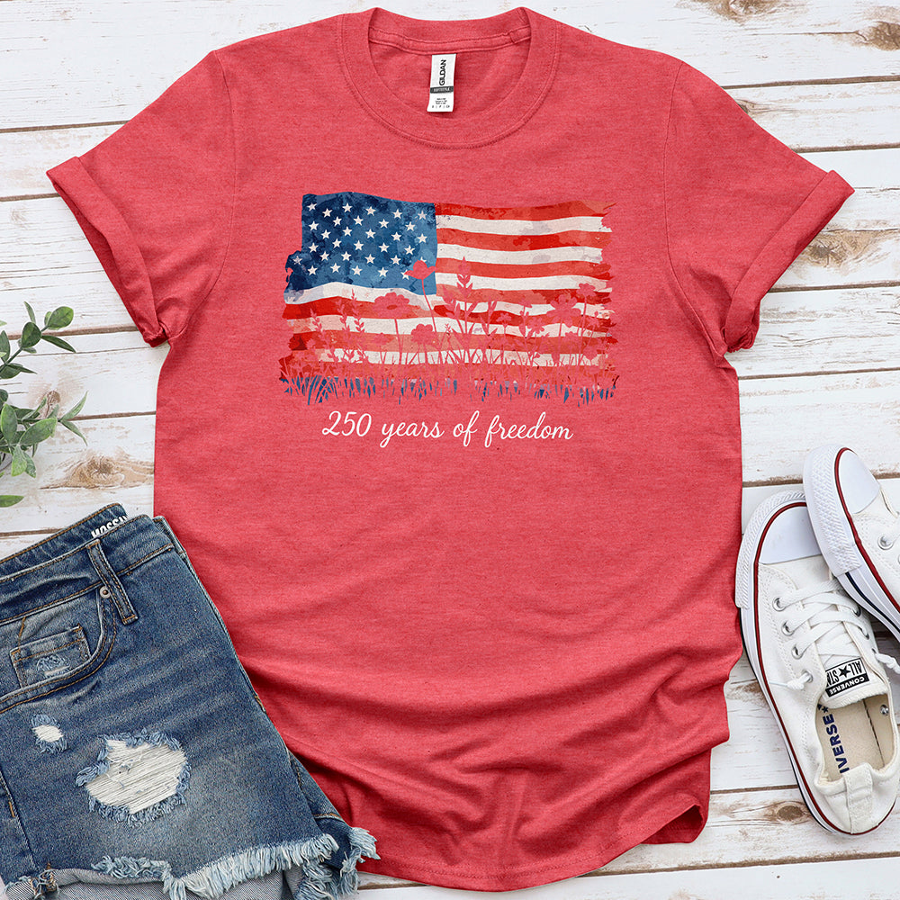 Heather red patriotic t-shirt with American flag, wildflowers, and '250 years of freedom' text