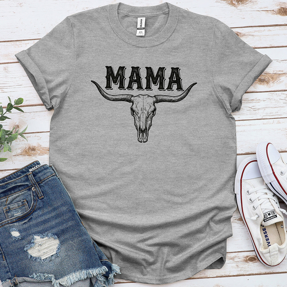 Sport grey graphic t-shirt with 'MAMA' and bull skull design, laid flat with denim shorts and sneakers