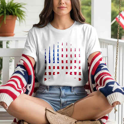 Woman wearing Proud & Free white American flag smoke tee with patriotic cardigan on porch