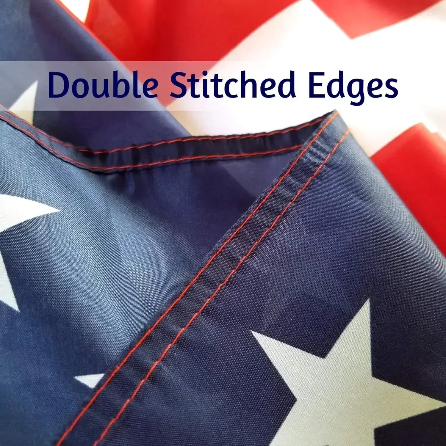 Close-up of authentic American flag with double stitched edges, red, white, and blue stars.
