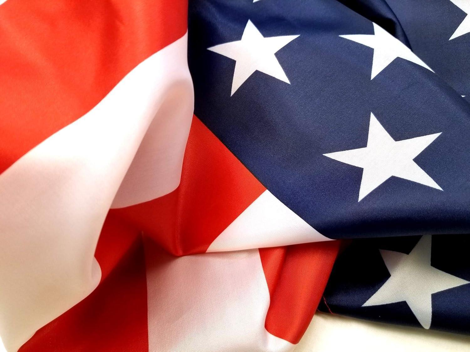 Close-up of authentic American flag with red, white, and blue stars and stripes fabric