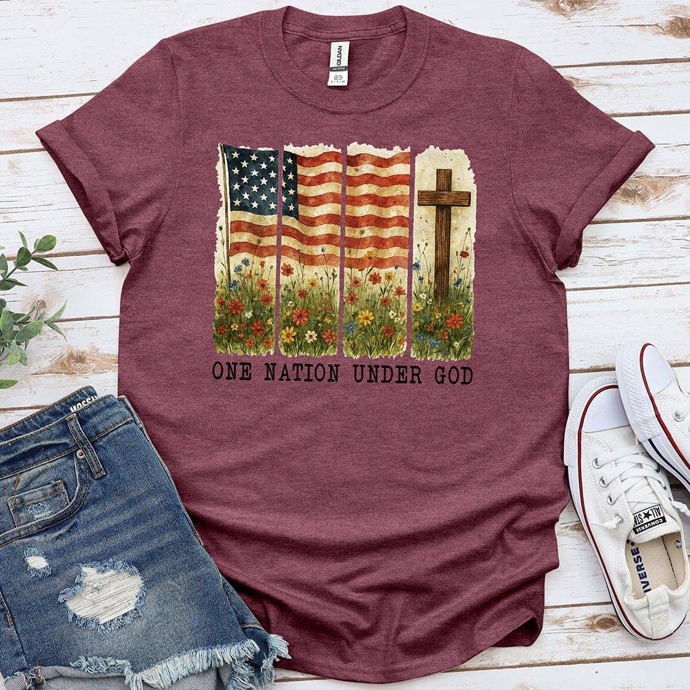 Burgundy t-shirt with American flag, cross, wildflowers, and 'One Nation Under God' text