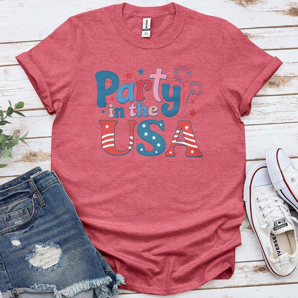 Red Party in the USA tee with patriotic lettering, denim shorts, and white sneakers