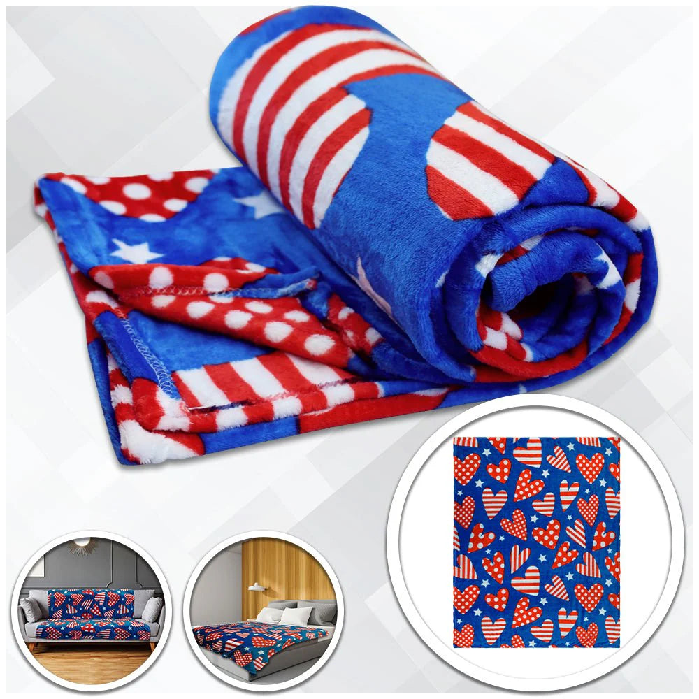 Patriotic hearts plush blanket in red, white, and blue stars and stripes on sofa and bed