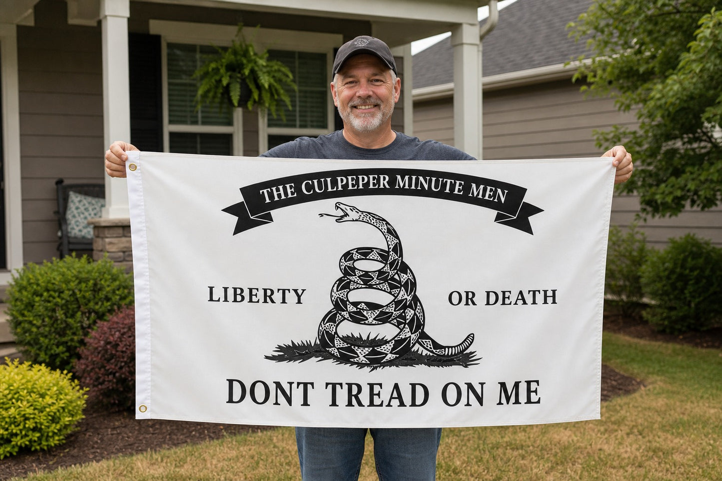 Culpeper Minutemen Flag held in yard