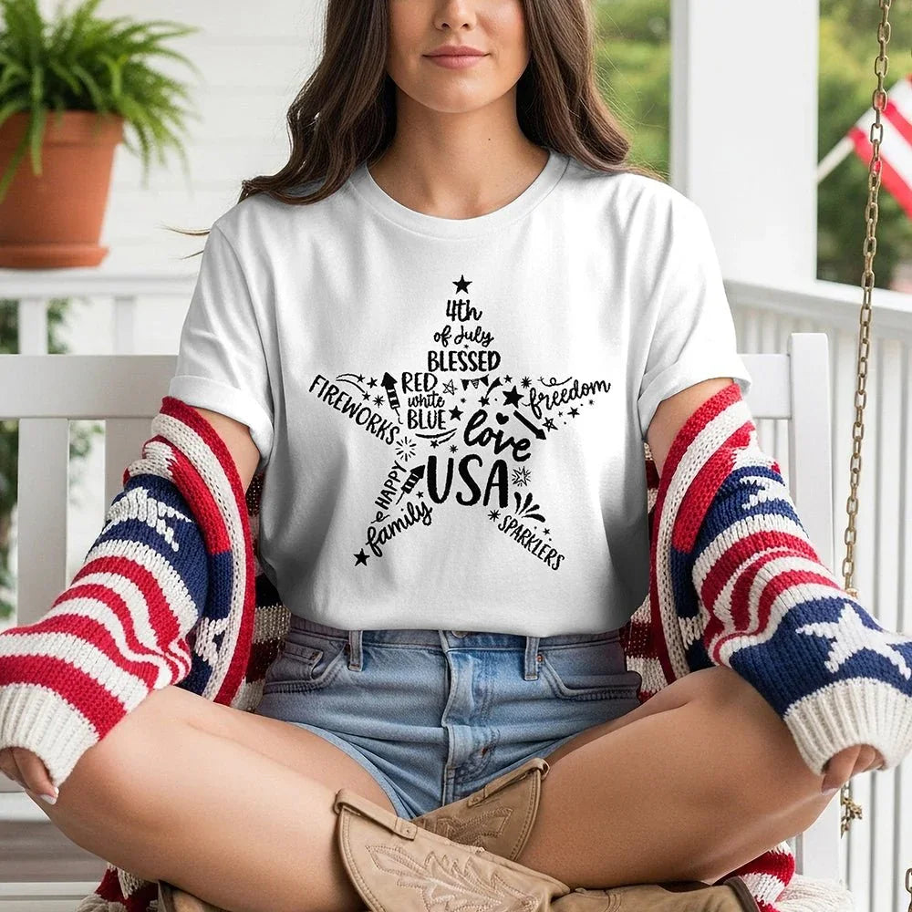 Woman wearing Star of Freedom USA patriotic tee and American flag sweater on porch