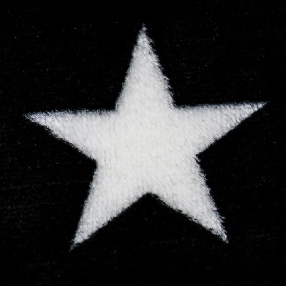 Closeup of white star on soft black plush blanket, Thin Red Line design, Proud & Free