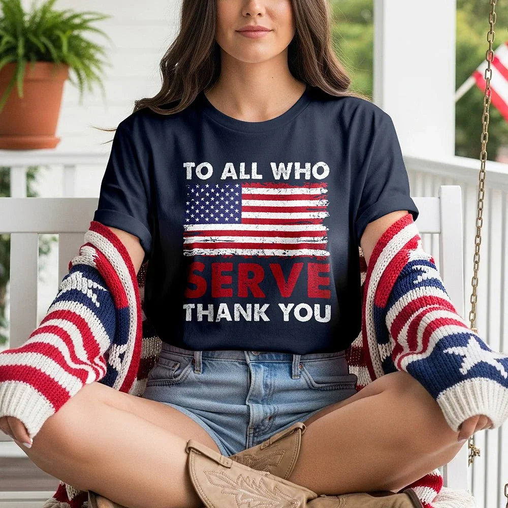 Woman in patriotic tee with American flag and 'To All Who Serve Thank You' message, porch setting