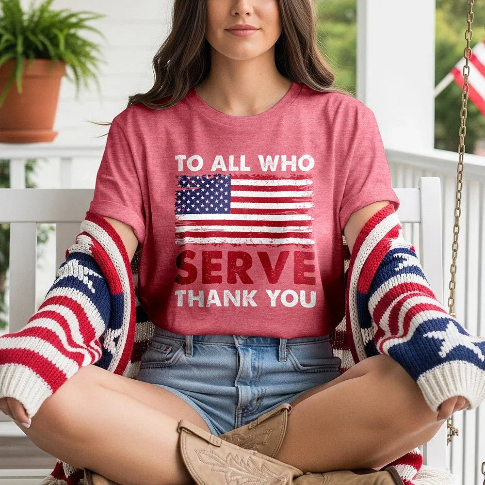 Woman wearing 'To All Who Serve Thank You' American flag tee, patriotic cardigan, porch setting
